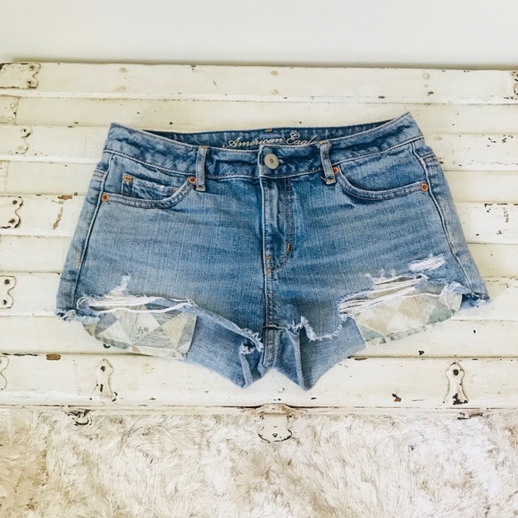 light wash distressed denim shorts